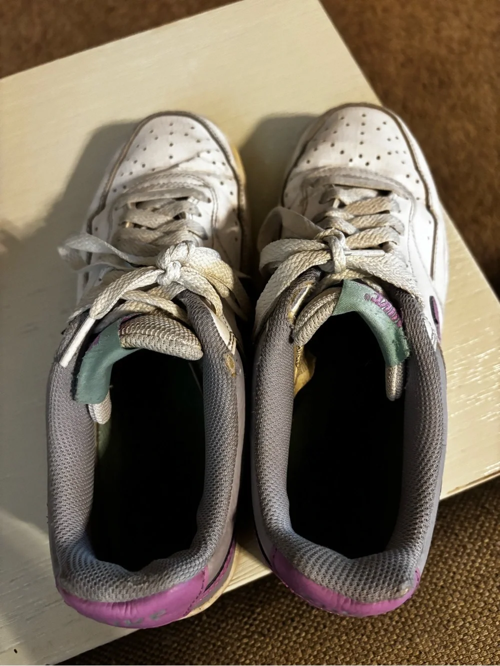 Nike Women’s White Sneakers with Purple Swoosh